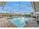 Relaxing pool with covered patio and outdoor seating at 162 Croop Se Ln, Port Charlotte, FL 33952