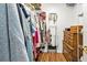 Well-organized walk-in closet with dresser and shelving at 162 Croop Se Ln, Port Charlotte, FL 33952