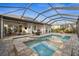 Resort-style pool and spa with covered patio at 17173 Bullhorn Cir, Punta Gorda, FL 33982