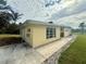 Ranch-style home with a walkway and grassy yard at 1905 Myrtle Ave, Punta Gorda, FL 33950