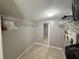 Spacious walk-in closet with shelving and hanging rods at 1905 Myrtle Ave, Punta Gorda, FL 33950