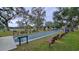 Community bocce ball court with benches at 19505 Quesada Ave # U201, Port Charlotte, FL 33948