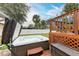 Hot tub on deck overlooking the backyard at 20352 Andover Ave, Port Charlotte, FL 33954