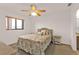 Bedroom with carpet, a double bed, and ceiling fan at 25225 Rampart Blvd # 1606, Punta Gorda, FL 33983