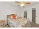Bedroom with double bed, nightstand and ceiling fan at 25225 Rampart Blvd # 1606, Punta Gorda, FL 33983