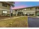 Evening view of a light green residential building at 25225 Rampart Blvd # 1606, Punta Gorda, FL 33983