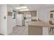 Bright kitchen featuring white appliances at 25225 Rampart Blvd # 1606, Punta Gorda, FL 33983