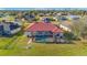 Aerial view showcasing home with pool and spacious backyard at 25606 Aysen Dr, Punta Gorda, FL 33983