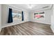 Bright living room with vinyl flooring and large windows at 30087 Alder Rd, Punta Gorda, FL 33982