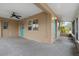 Cozy screened porch with access to both the interior and exterior at 30087 Alder Rd, Punta Gorda, FL 33982