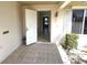 Front door entrance with tiled flooring and a glimpse of the interior at 310 Capri Isles Ct, Punta Gorda, FL 33950