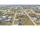 Aerial view of a house and surrounding neighborhood at 313 Bolender St, Punta Gorda, FL 33982