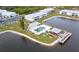 Aerial view of community pool and lakefront at 3300 Loveland Blvd # 3303, Punta Gorda, FL 33980