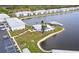 Community overview with pool and lake access at 3300 Loveland Blvd # 3303, Punta Gorda, FL 33980