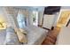 Bedroom with a view of the patio and updated flooring at 3300 Loveland Blvd # 3303, Punta Gorda, FL 33980