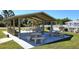 Relaxing community gazebo with tables and benches at 3300 Loveland Blvd # 3303, Punta Gorda, FL 33980
