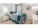 Cozy bedroom with teal bedding and plenty of closet space at 3340 Jennings Blvd, Port Charlotte, FL 33981