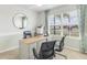 Home office with built-in desk and ample natural light at 3340 Jennings Blvd, Port Charlotte, FL 33981