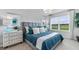 Spacious main bedroom with plush bedding and large window at 3340 Jennings Blvd, Port Charlotte, FL 33981