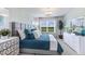 Main bedroom with a king-size bed and plenty of natural light at 3340 Jennings Blvd, Port Charlotte, FL 33981