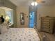 Relaxing bedroom with a starfish theme and ensuite bathroom at 3761 Peace River Dr, Punta Gorda, FL 33983
