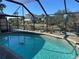 Relaxing screened pool with water view at 3761 Peace River Dr, Punta Gorda, FL 33983