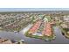 Community overview, showcasing waterfront homes and pool at 3830 Bal Harbor Blvd # 17, Punta Gorda, FL 33950