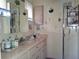 Clean bathroom with single sink vanity and shower at 3830 Bal Harbor Blvd # 17, Punta Gorda, FL 33950