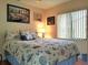 Bright bedroom with a full-size bed and window at 3830 Bal Harbor Blvd # 17, Punta Gorda, FL 33950