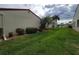 Landscaped yard and canal view at 3830 Bal Harbor Blvd # 17, Punta Gorda, FL 33950