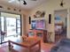 Living room with TV, comfortable seating, and bedroom access at 3830 Bal Harbor Blvd # 17, Punta Gorda, FL 33950