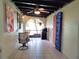 Relaxing patio with table, chairs, and grill at 3830 Bal Harbor Blvd # 17, Punta Gorda, FL 33950