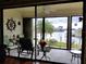 Bright sunroom offers relaxing water views and outdoor access at 3830 Bal Harbor Blvd # 17, Punta Gorda, FL 33950