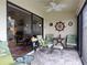 Peaceful sunroom with water views and comfortable seating at 3830 Bal Harbor Blvd # 17, Punta Gorda, FL 33950