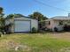 View of detached garage from the side yard at 4363 Sansedro St, Port Charlotte, FL 33948