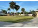 Large vacant lot with mature palm trees at 4363 Sansedro St, Port Charlotte, FL 33948