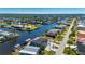 Aerial view of house and neighborhood, waterfront property at 4600 Almar Dr, Punta Gorda, FL 33950