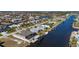Aerial view of home on canal, showcasing location and neighborhood at 4600 Almar Dr, Punta Gorda, FL 33950