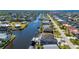 Aerial view highlighting the home's waterfront location at 4600 Almar Dr, Punta Gorda, FL 33950