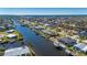 Aerial view showcasing waterfront property and boat dock at 4600 Almar Dr, Punta Gorda, FL 33950