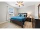 Primary bedroom with a king-size bed and wood flooring at 4600 Almar Dr, Punta Gorda, FL 33950
