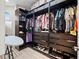 Spacious walk-in closet with ample shelving and drawers at 4600 Almar Dr, Punta Gorda, FL 33950