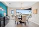 Bright dining room with water views and seating for six at 4600 Almar Dr, Punta Gorda, FL 33950