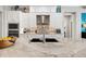 Gourmet kitchen with granite countertops, custom cabinetry, and a tile backsplash at 4600 Almar Dr, Punta Gorda, FL 33950