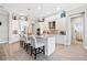 Spacious kitchen with white cabinets, granite island, and stainless steel appliances at 4600 Almar Dr, Punta Gorda, FL 33950