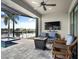 Relaxing pool area with patio furniture and fire pit at 4600 Almar Dr, Punta Gorda, FL 33950
