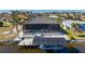 Private pool, screened enclosure, and dock with boat lift at 4600 Almar Dr, Punta Gorda, FL 33950