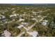 Wide aerial view of neighborhood and waterfront at 5273 Grassland Ter, Port Charlotte, FL 33981