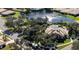 Aerial view of community pool, clubhouse, and surrounding homes at 6139 Grand Cypress Blvd, North Port, FL 34287