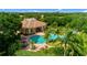 Community pool and clubhouse aerial view at 6139 Grand Cypress Blvd, North Port, FL 34287